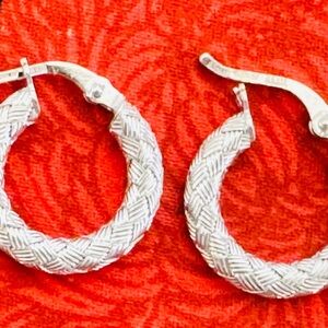 Roberto Coin Vintage 18 karat white gold woven hoop earrings.